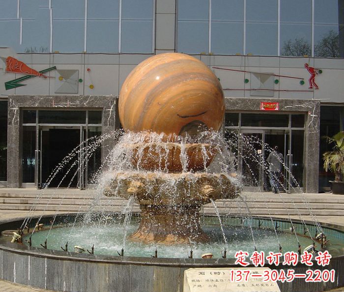 佛山石来运转球晚霞红风水球石雕
