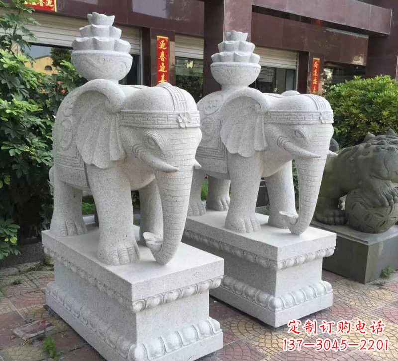 佛山驮元宝的大象石雕