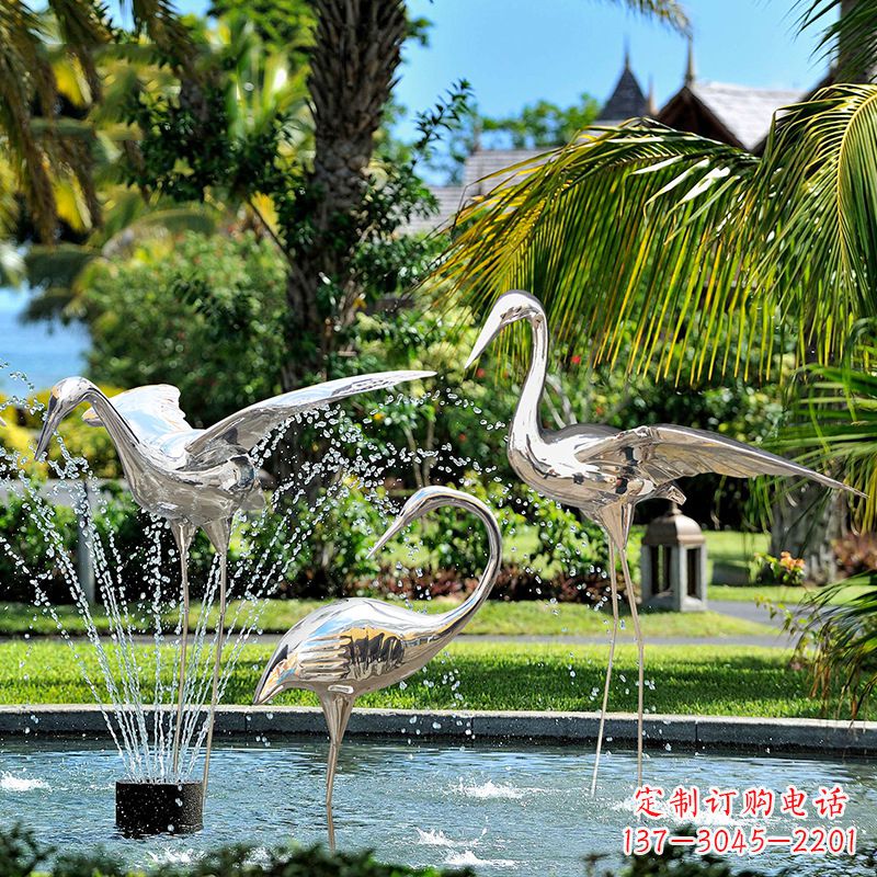 佛山仙鹤雕塑-公园池塘不锈钢喷泉中的仙鹤雕塑