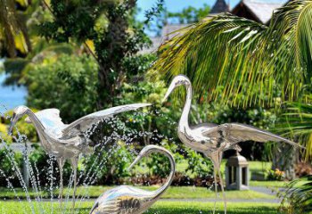 佛山鹤雕塑-公园池塘不锈钢镜面抽象喷泉中的鹤雕塑