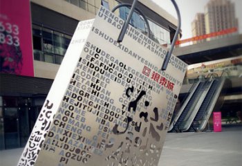 佛山购物袋雕塑-步行街室外锻造刻字不锈钢购物袋雕塑